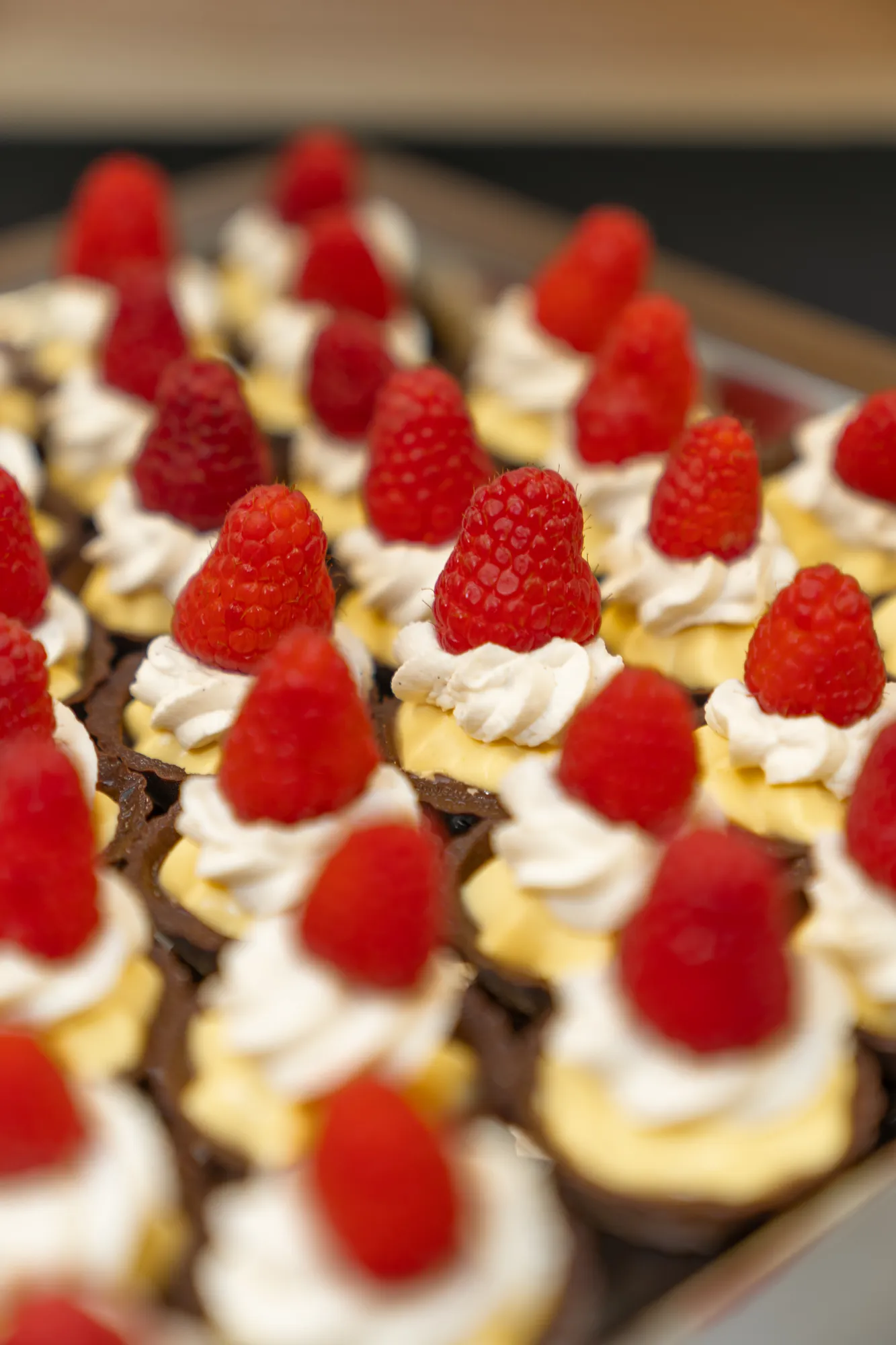 Raspberry cream tartlets on a dessert table at TillingHouse