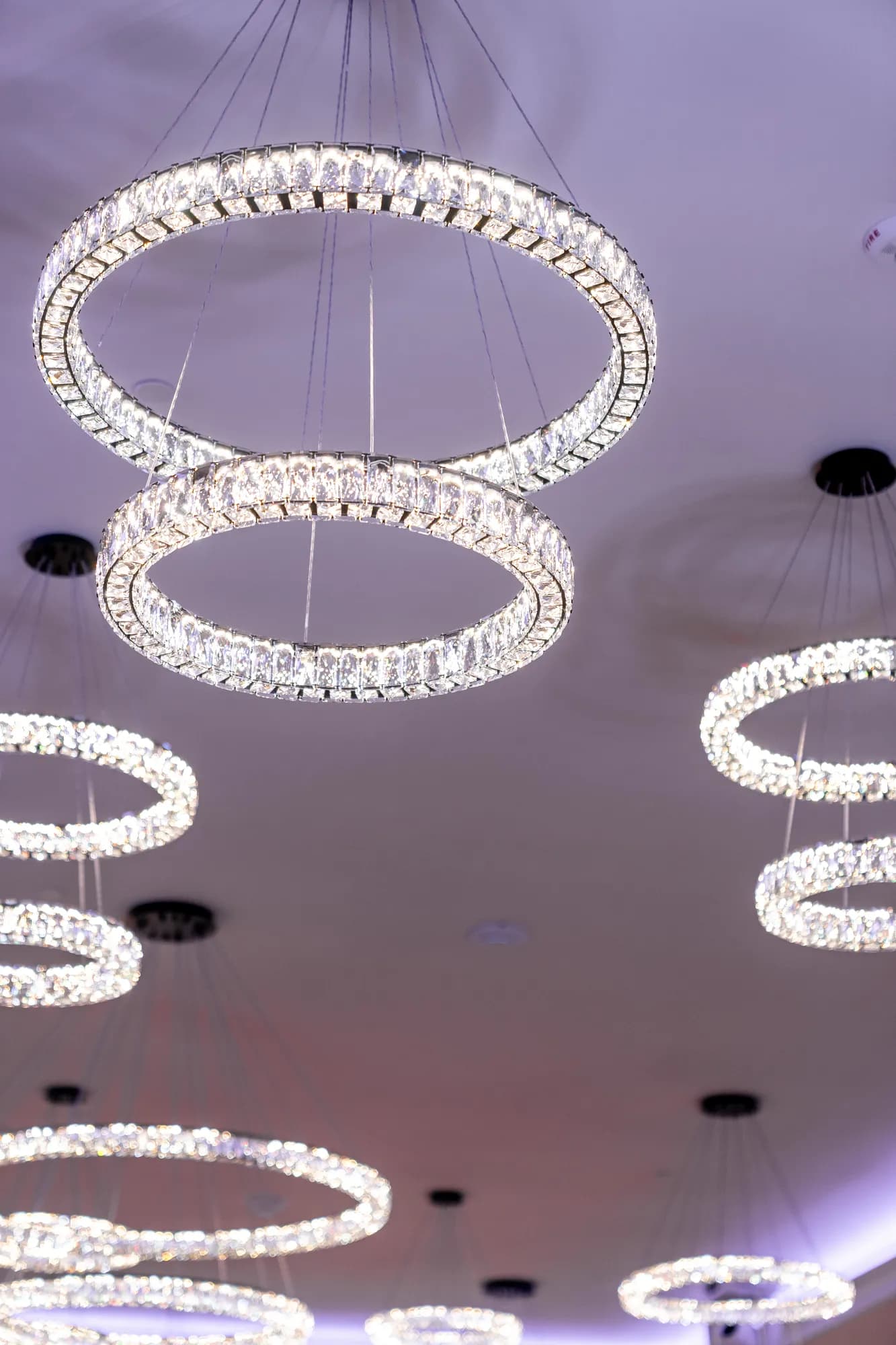 Circular crystal ring chandeliers in the TillingHouse ballroom