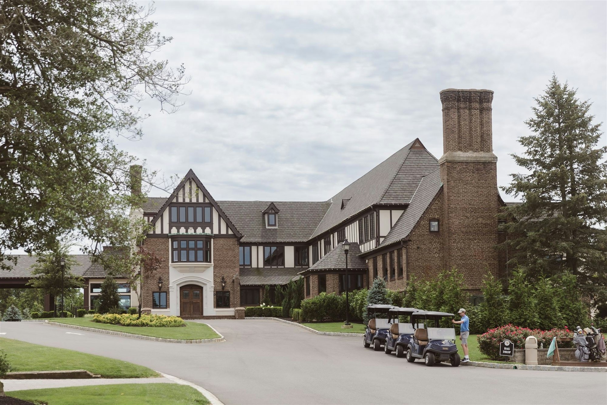 The historic Tudor mansion at TillingHouse in Eatontown, New Jersey seen from the front drive